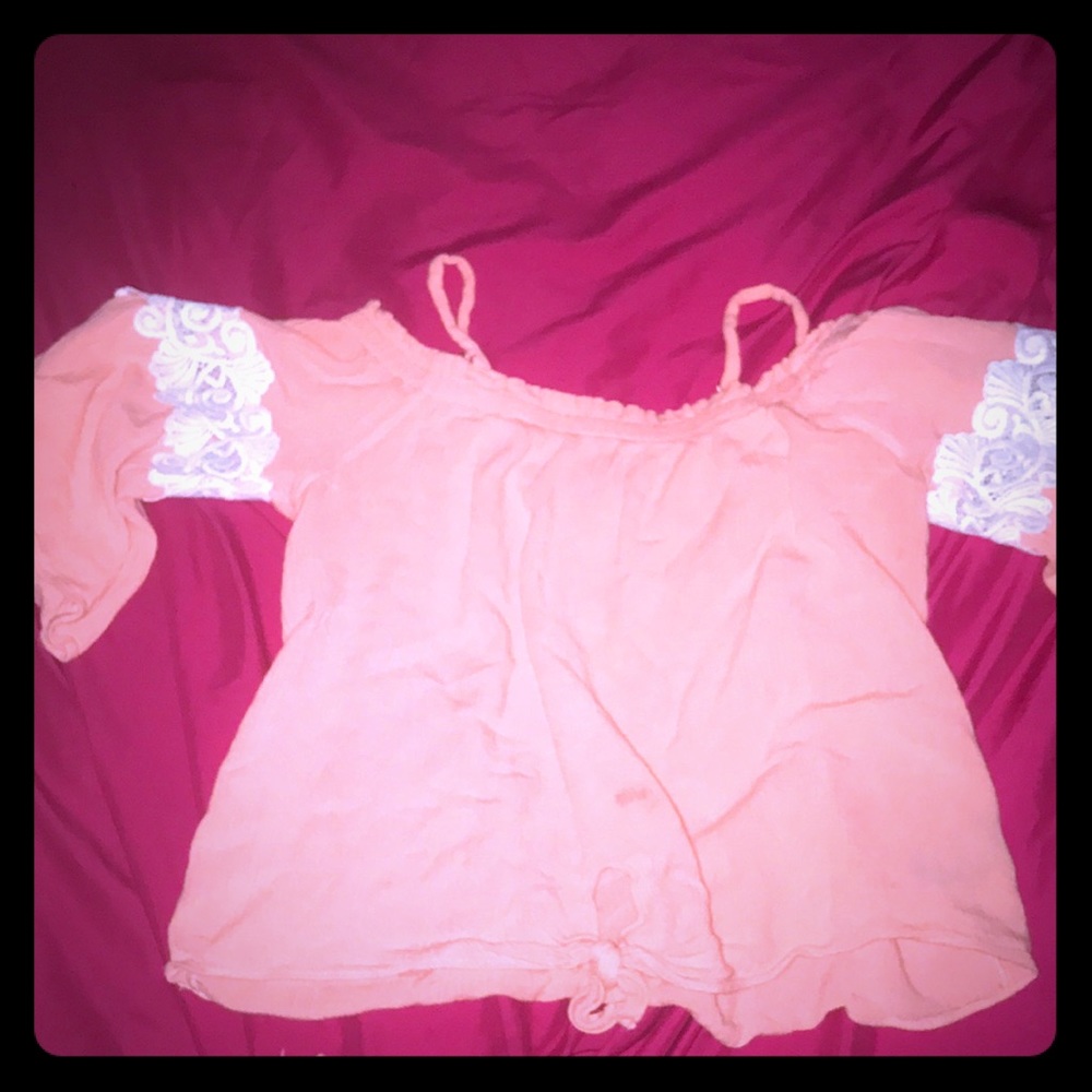 It’s a cute crop top for kids.